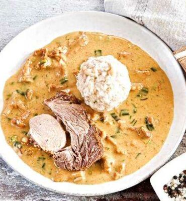 Schweineschopf mit Eierschwammerlsoße Rezept